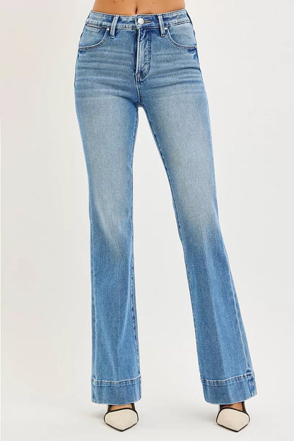 Diya Mid-Rise Flare Jeans styled with heels for a retro-inspired look.