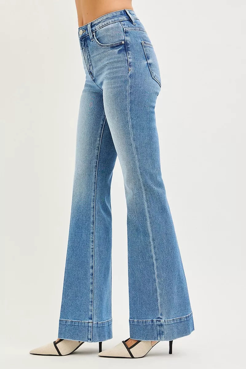 Side angle of Diya Mid-Rise Flare Jeans highlighting flattering flare silhouette.