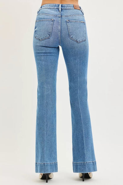 Back view of Diya Mid-Rise Flare Jeans showing smooth shaping fit.