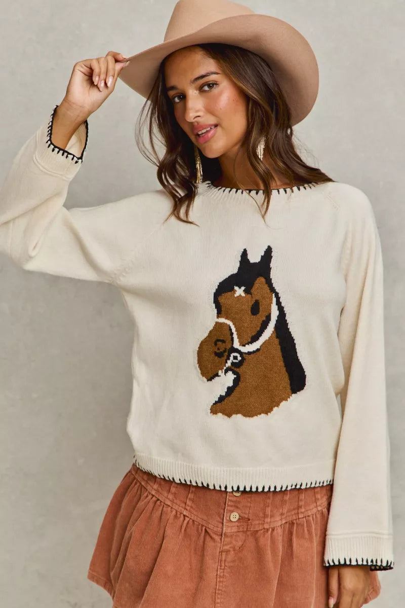 Front view of Dolly Horse Knit Sweater Top showing horse print and round neckline.
