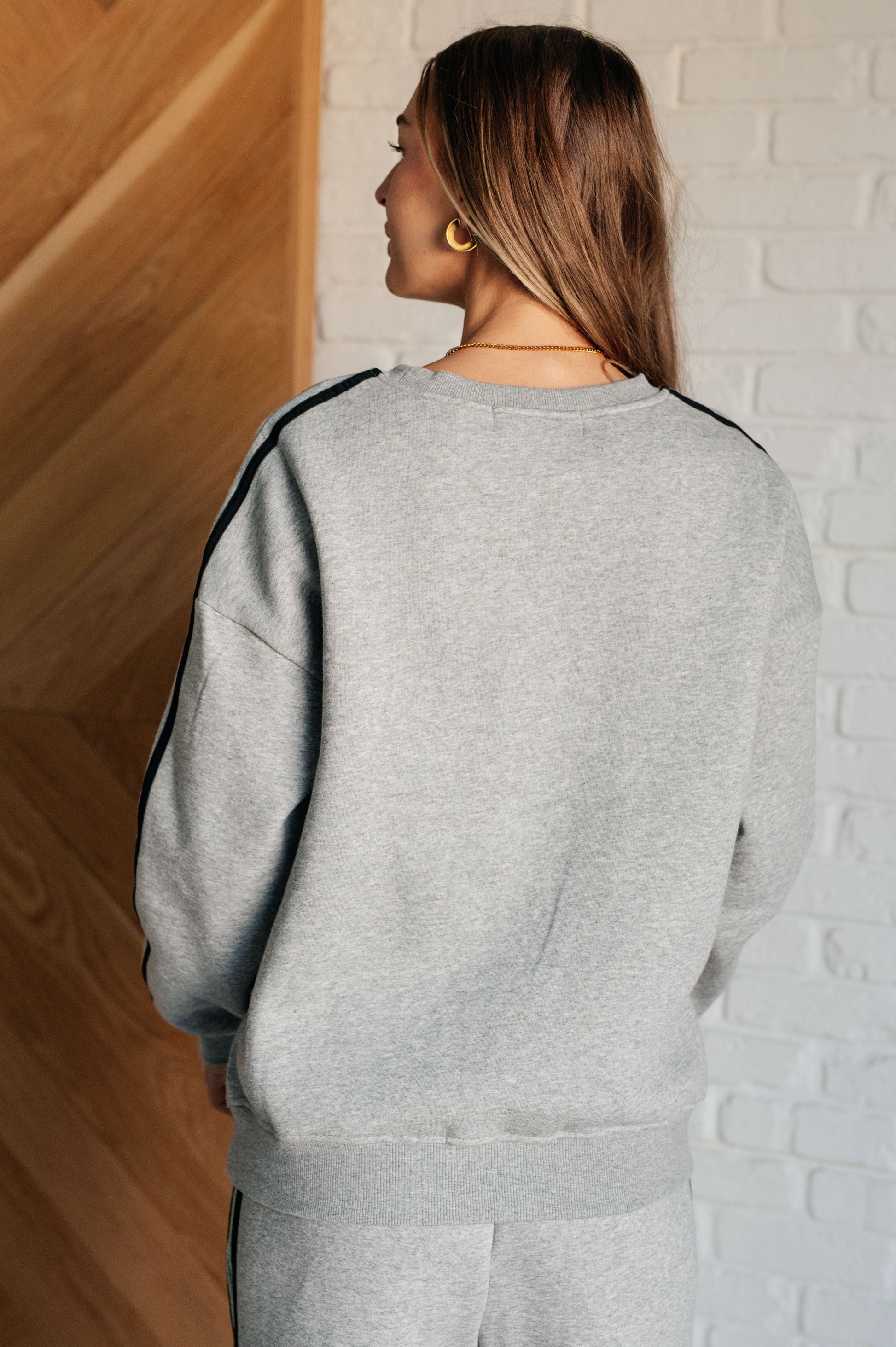 Sweatshirt in fleece, featuring a ribbed, banded round neckline, long drop shoulder sleeves, ribbed cuffs and hemline with trendy stripe detailing. 