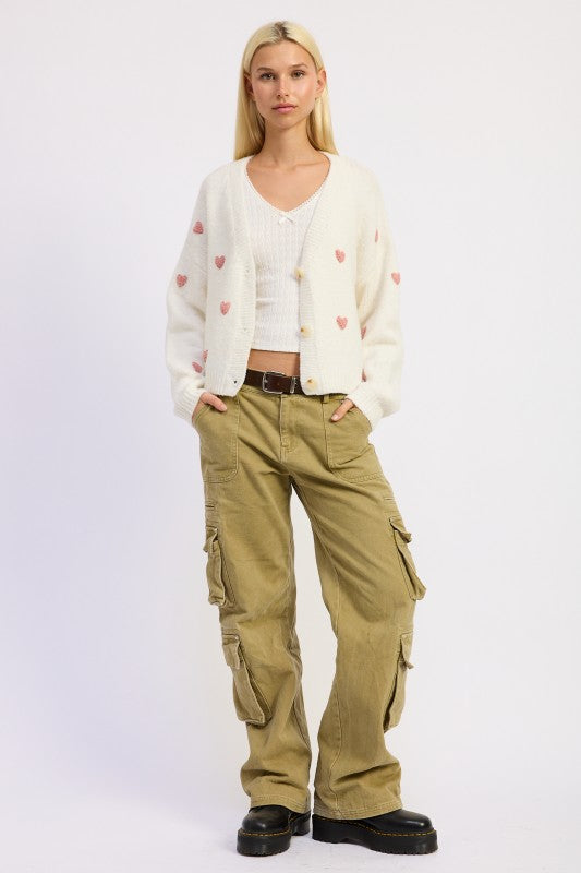 Front view of Donna Cropped Cardigan showing button-down front and heart details.