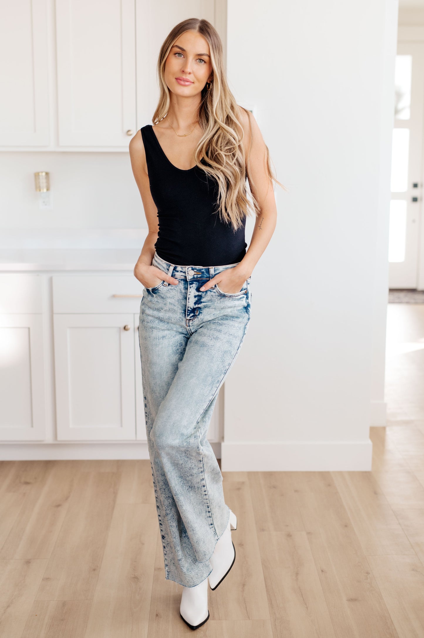 Judy Blue Dory High Waist Mineral Wash Raw Hem Wide Leg Jeans, featuring a zip fly, 4-way stretch, and a stylish raw hem for a trendy fit.