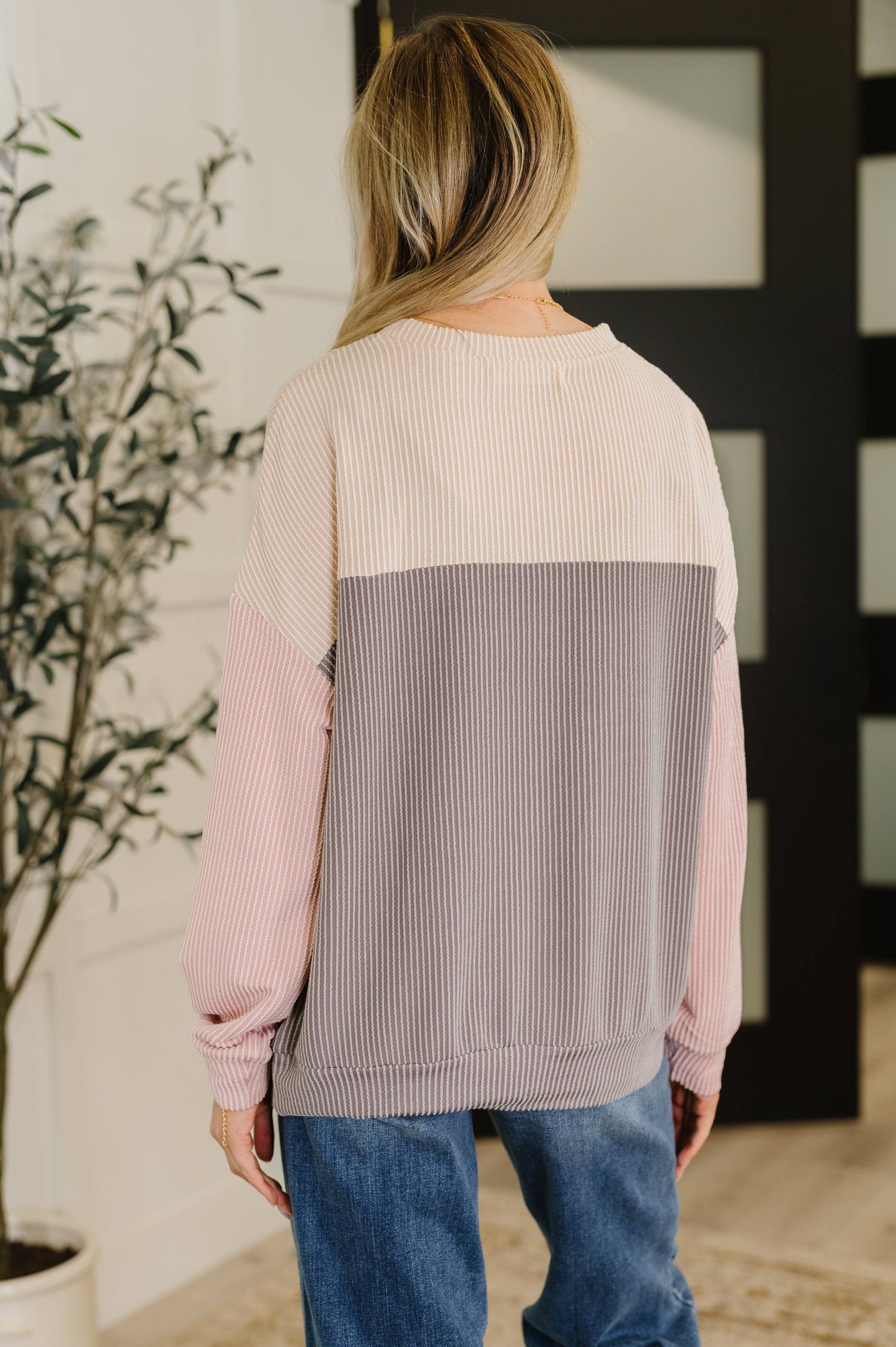 Back of Jaylani Color Block Pullover highlighting three-tone design