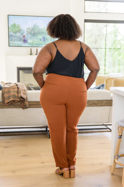 Back view of trendy plus size flowy tank top with a sleek look, styled for office or weekend outfits.