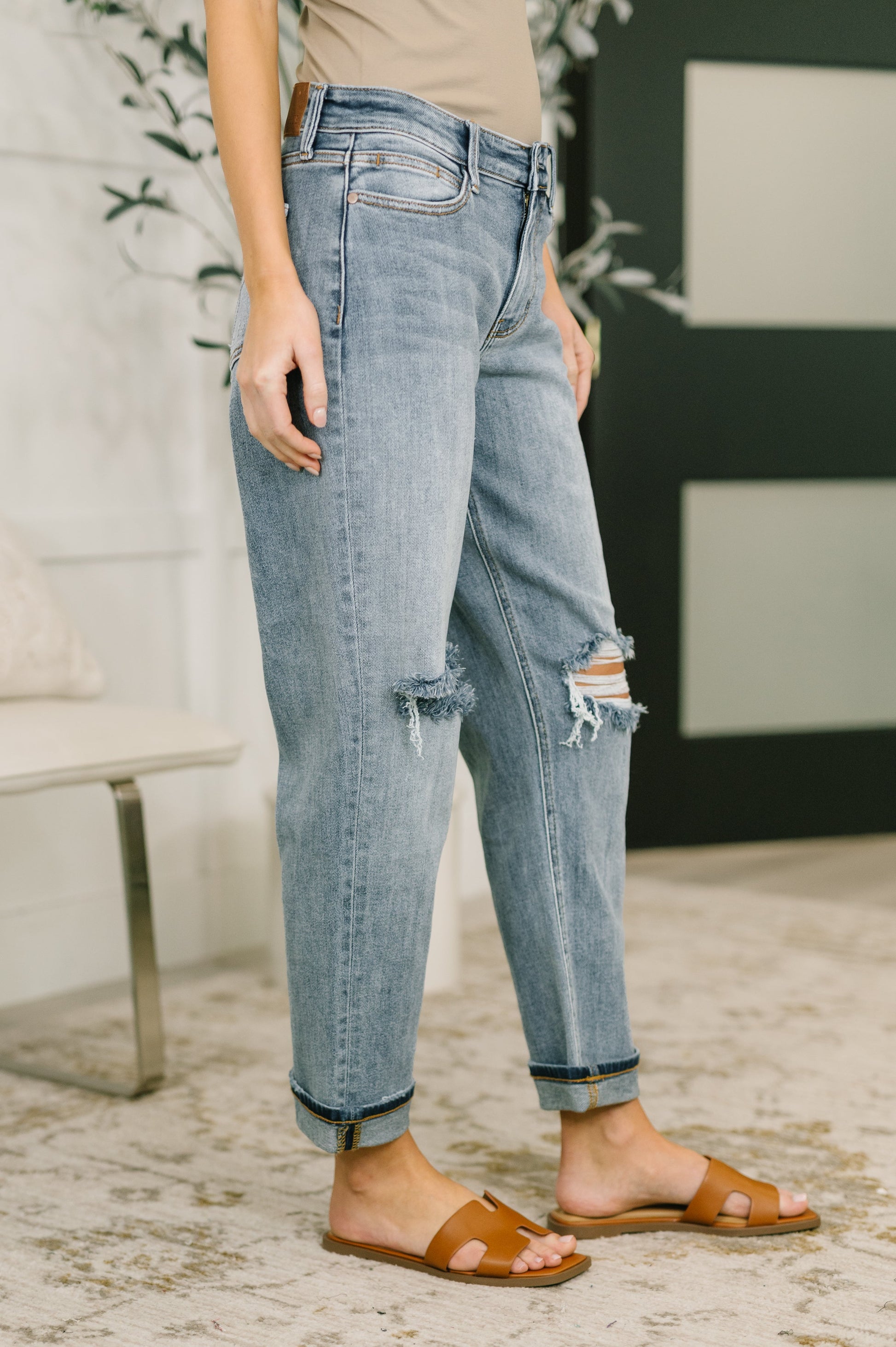 Angled view of Elaine Mid Rise Boyfriend Jeans by Judy Blue comfortable stretch denim.