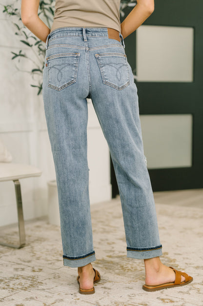 Back view of the Elaine Mid Rise Boyfriend Jeans by Judy Blue stretch denim silhouette.