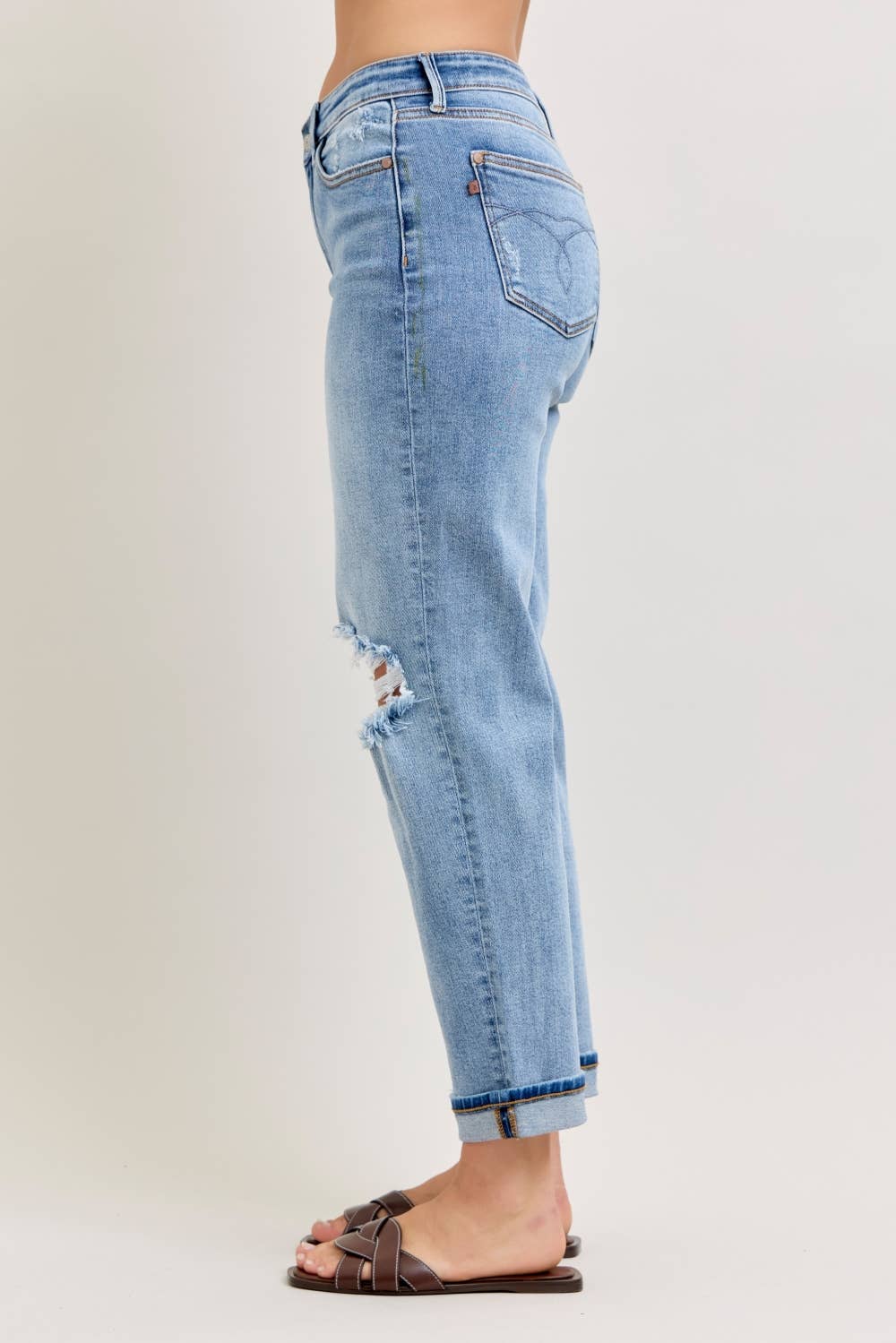 Side view of Elaine Mid Rise Boyfriend Jeans by Judy Blue highlighting relaxed boyfriend silhouette.