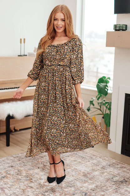 Everette ditsy floral maxi dress with 3/4 sheer sleeves and elastic waist, front angle.