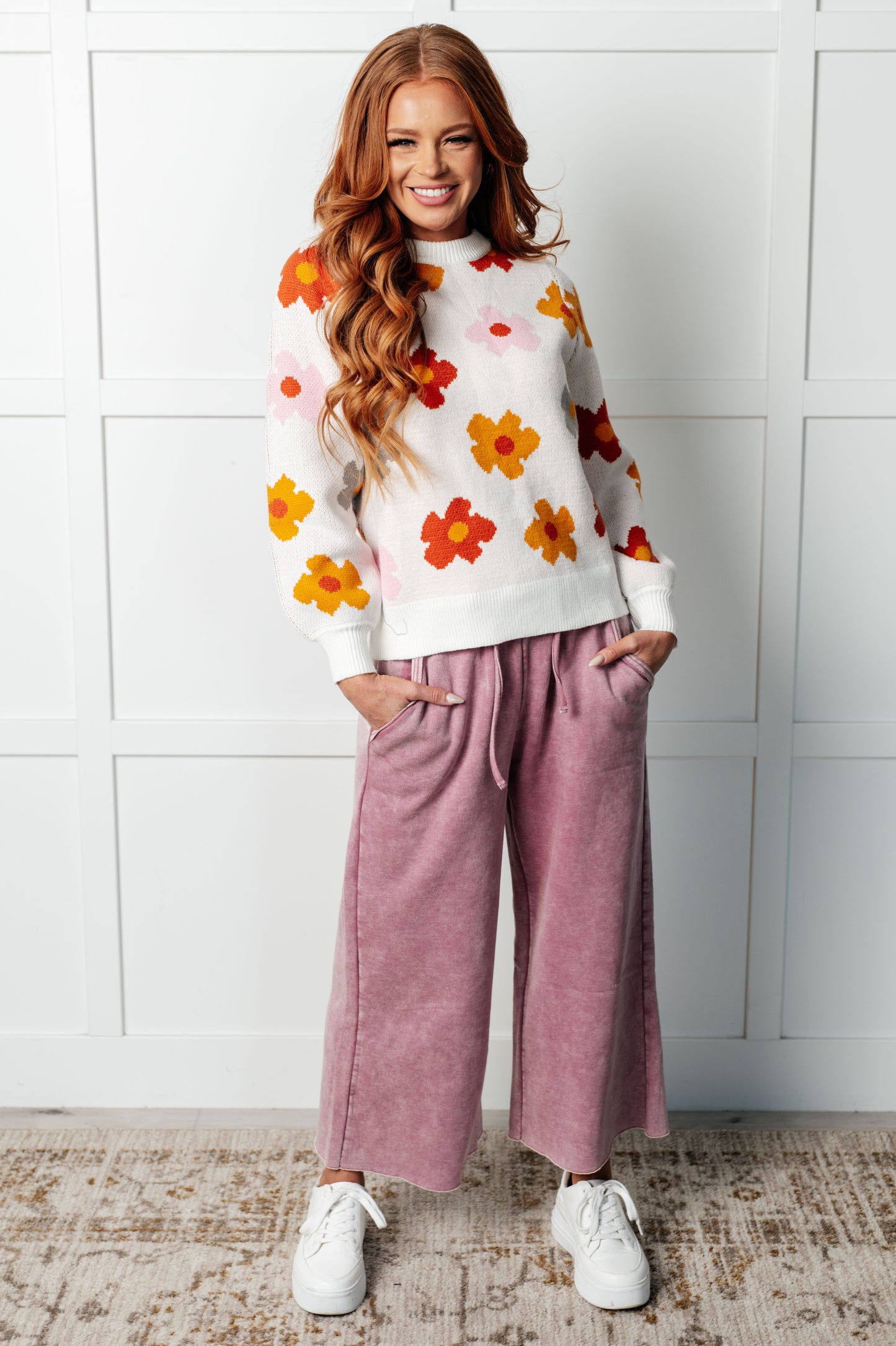 Full body view Kyla Floral Sweater styled with joggers