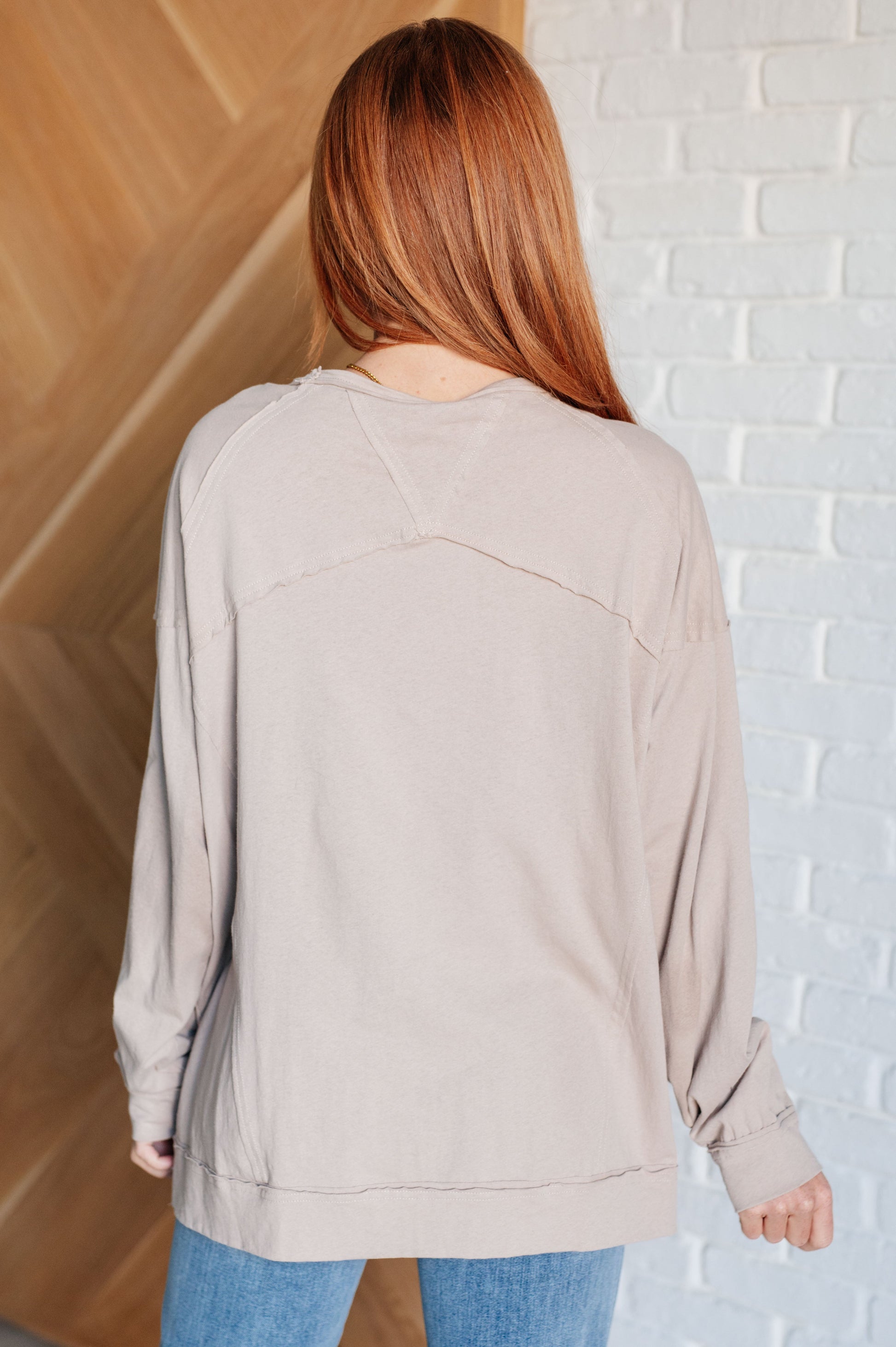 Haven Long Sleeve Top beige back view showing drop shoulders and seam detail
