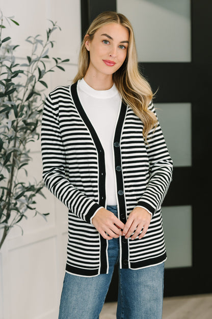 Finn Striped Cardigan in Black and White, front view showing button closure and V-neckline.