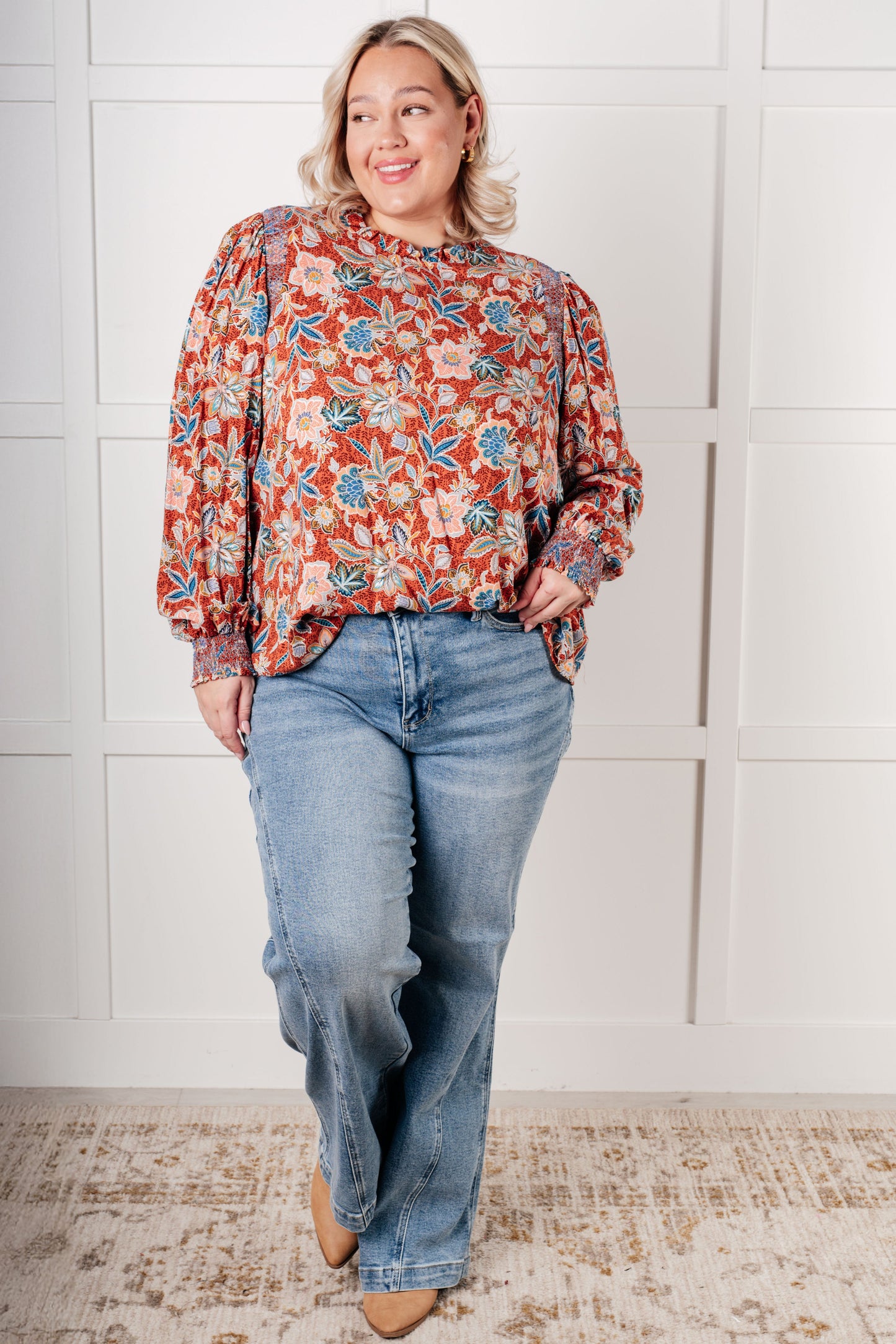 Plus size full body view of Blair Floral Blouse paired with jeans showing relaxed fit and floral print.