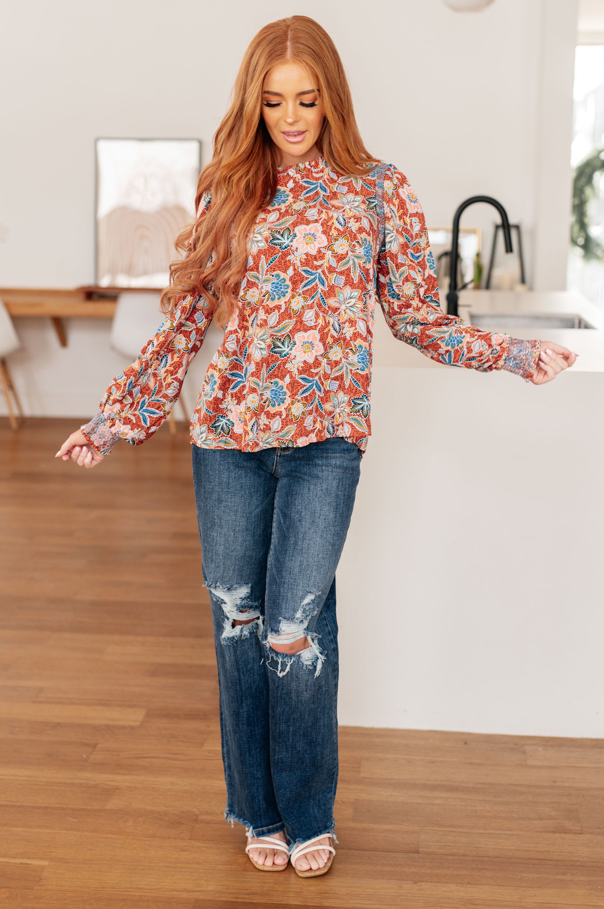 Full body view of Blair Floral Blouse worn with jeans styled for an everyday feminine fall outfit