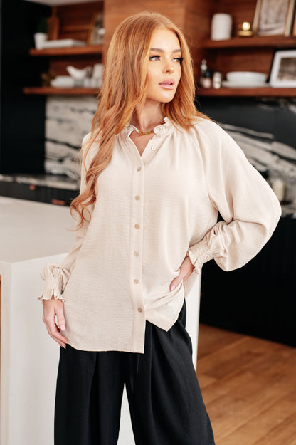 Florence Button Up Blouse in cream with ruffled neckline front view.
