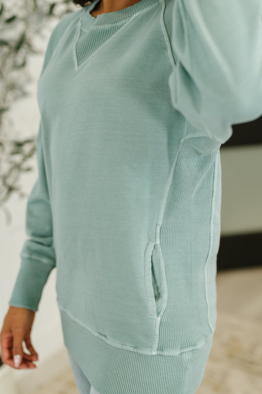 Hallie Relaxed Pullover in Ash Blue close up showing ribbed neckline and contrast detail
