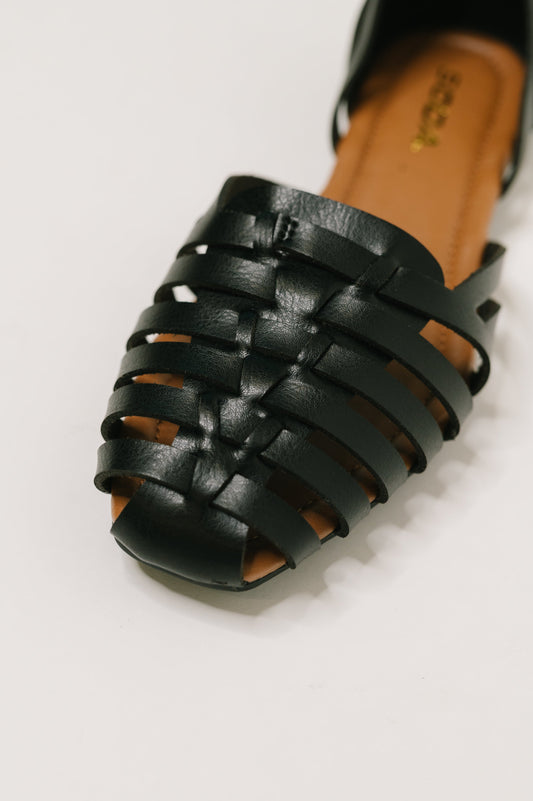 Close up of Gulla Woven Slip On Flats woven PU leather texture detail.