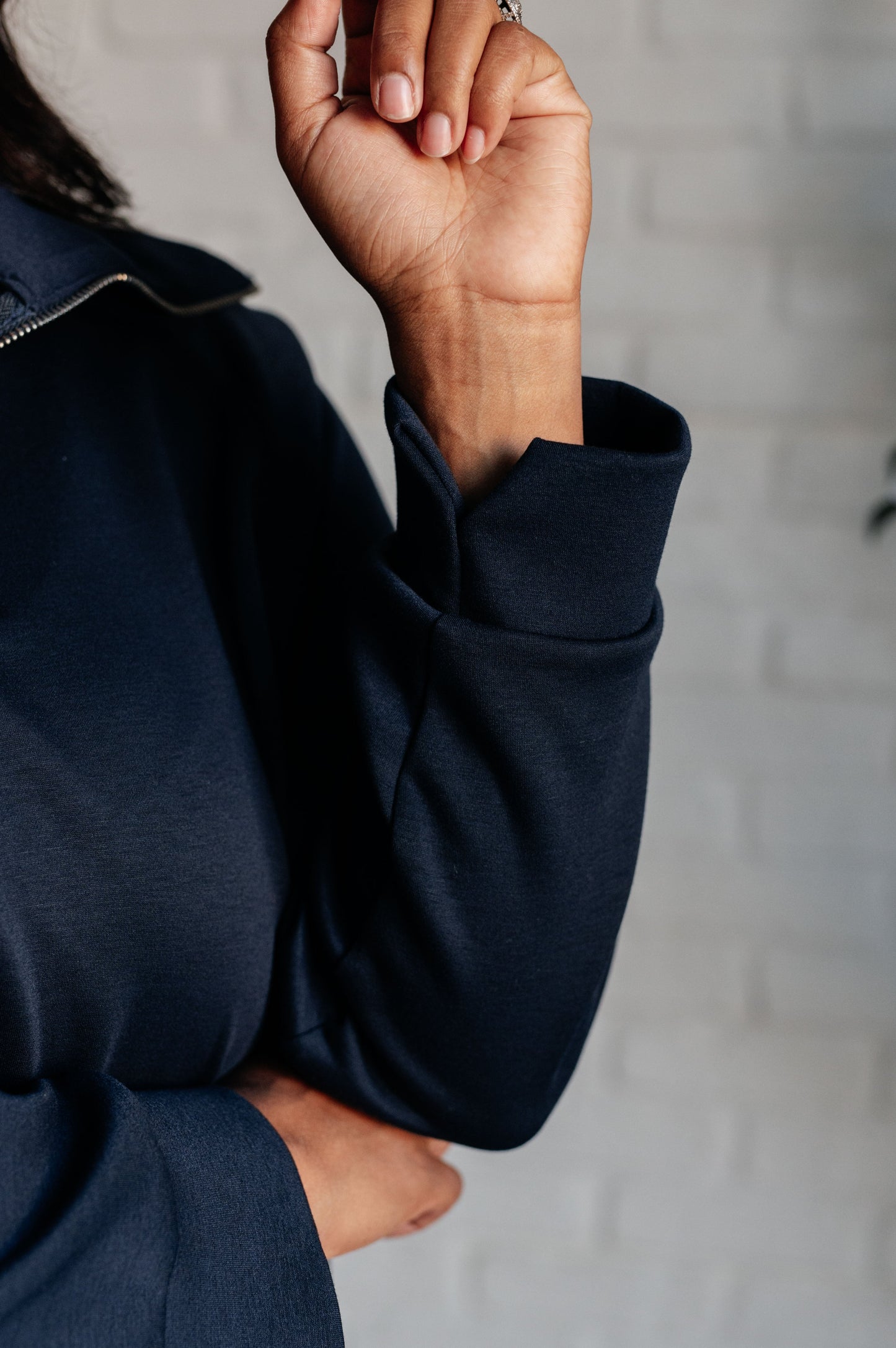 Women's Hampton Half Zip Pullover in Navy with soft scuba modal fabric, a mock neck, banded cuffs and hem, raglan sleeves, and a half-zip closure.