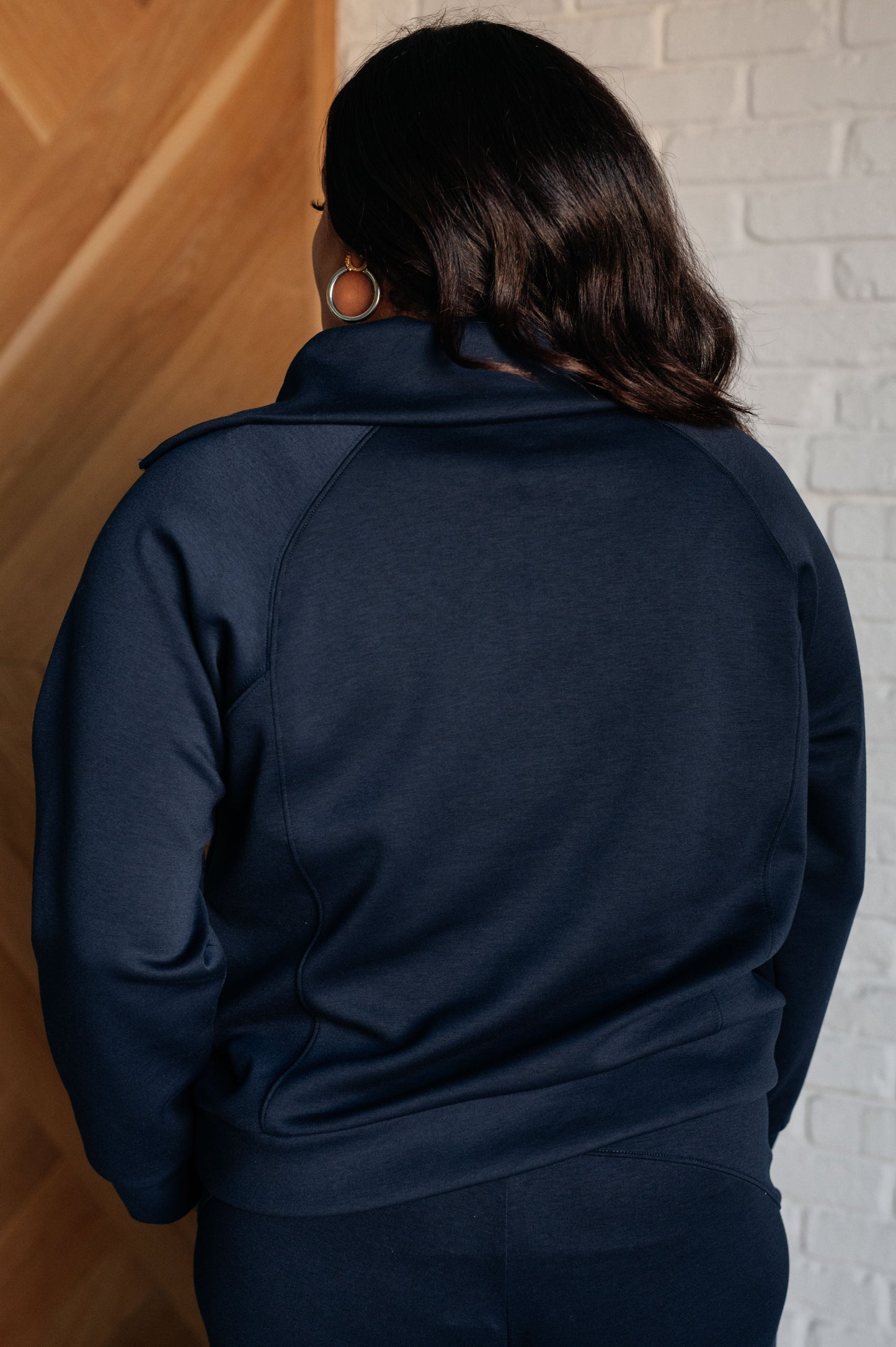 Women's Hampton Half Zip Pullover in Navy with soft scuba modal fabric, a mock neck, banded cuffs and hem, raglan sleeves, and a half-zip closure.