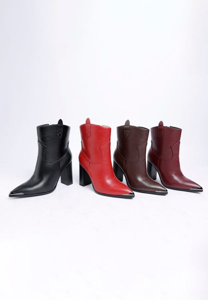 All variants of Hatter Pointed Toe Boots side by side in black, red, burgundy, and brown vegan leather