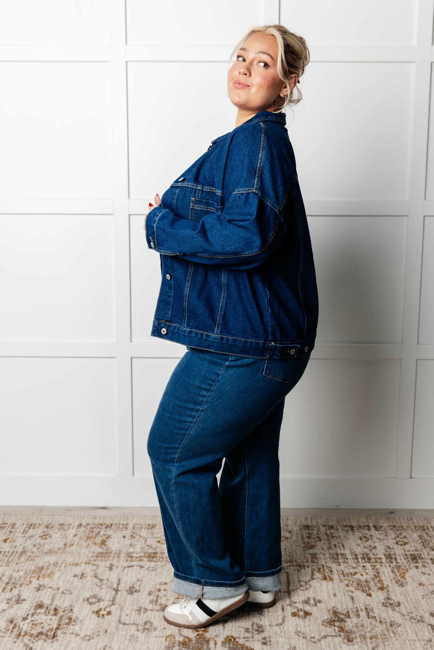 Havina Oversized Denim Jacket with collared neckline, front button closures, chest patch pockets, sleeve cuff buttons, and back pleat detail.