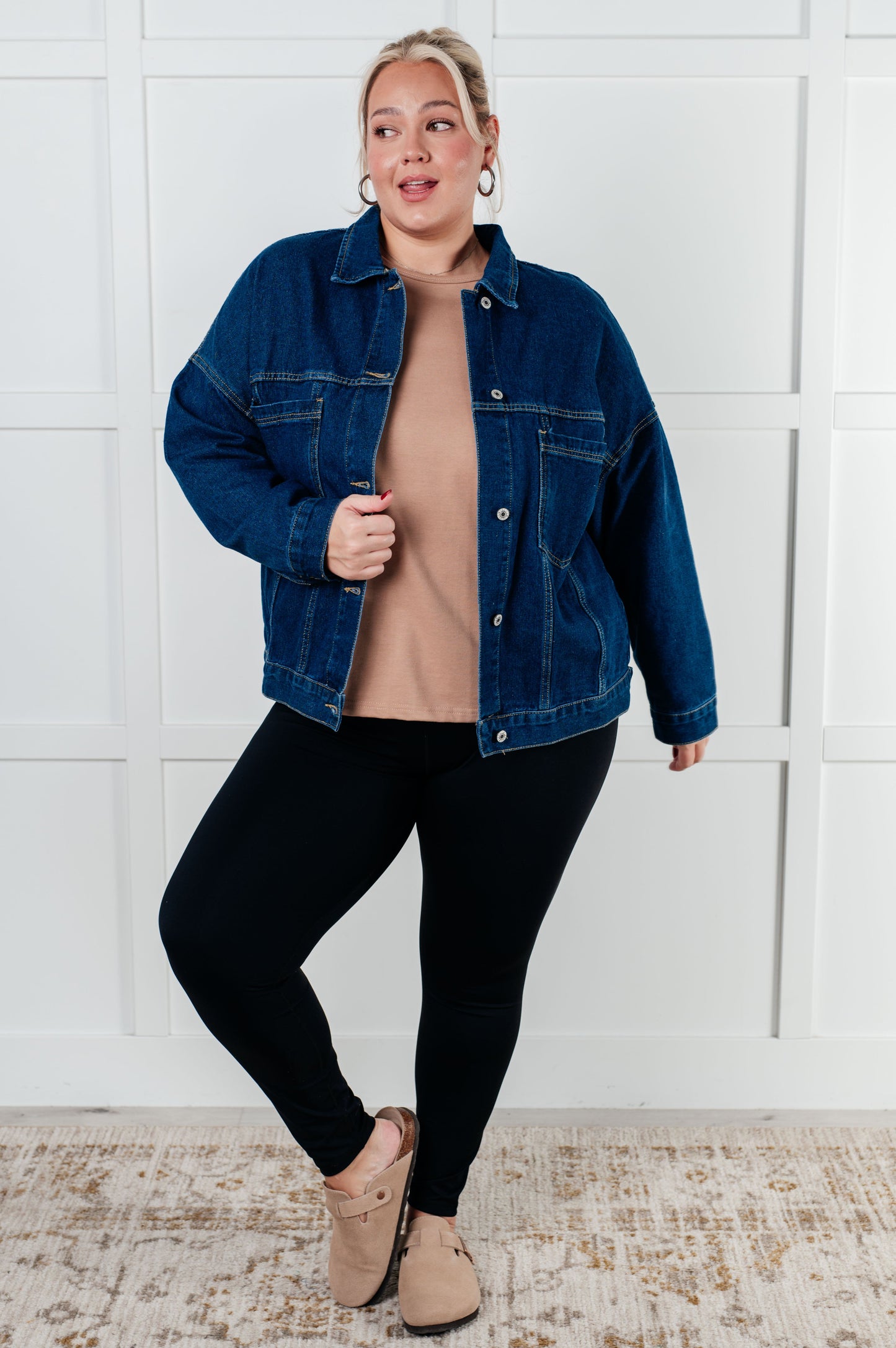 Havina Oversized Denim Jacket with collared neckline, front button closures, chest patch pockets, sleeve cuff buttons, and back pleat detail.