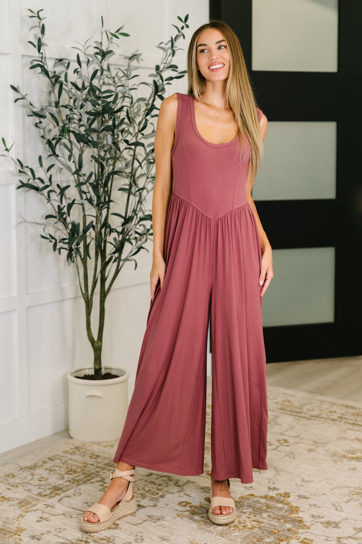 Front view of Pyper Mauve Ribbed Knit Jumpsuit with wide-leg silhouette and scooped neckline