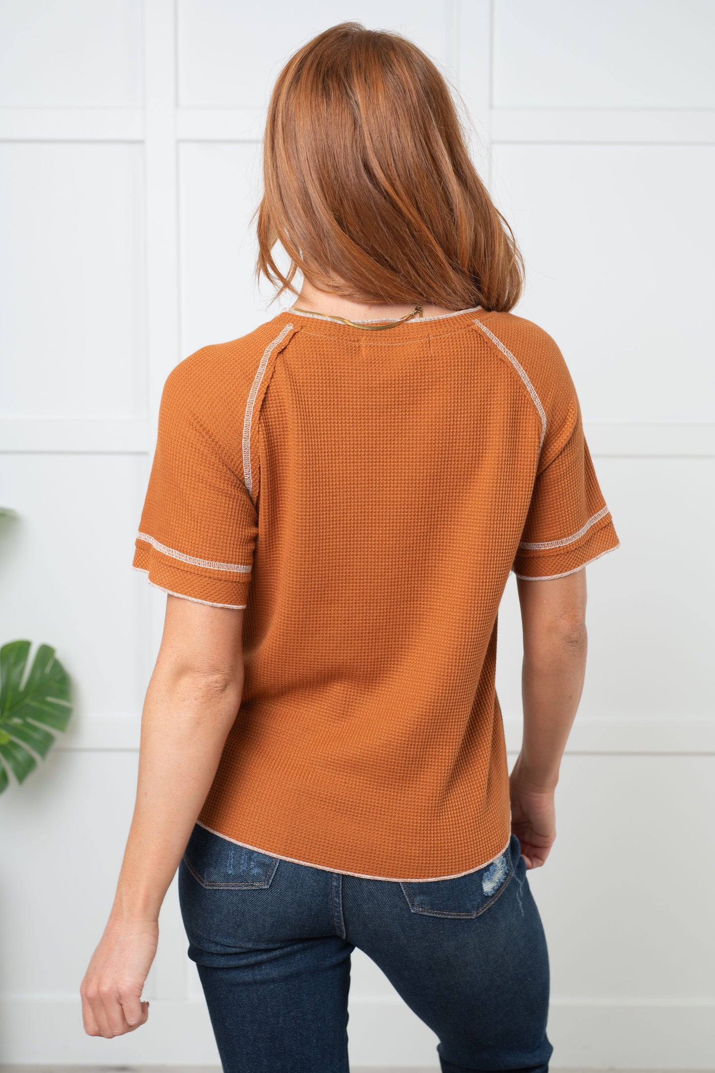 Waffle Knit Tee in Chestnut with round neckline, short raglan sleeves, and raw edge accents. 