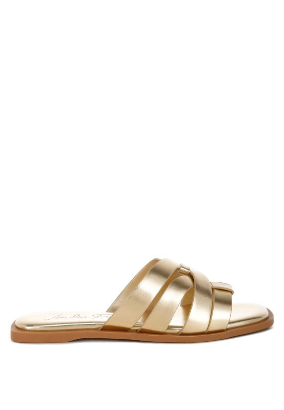Side view of Heble Metallic Slip Ons by Rag Company metallic finish and flat sole.