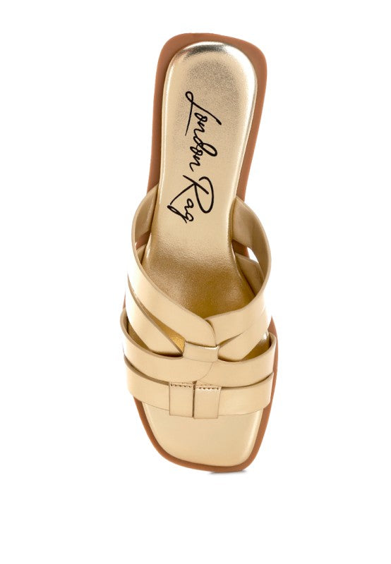 Close up of Heble Metallic Slip Ons by Rag Company woven strap detail and shine.