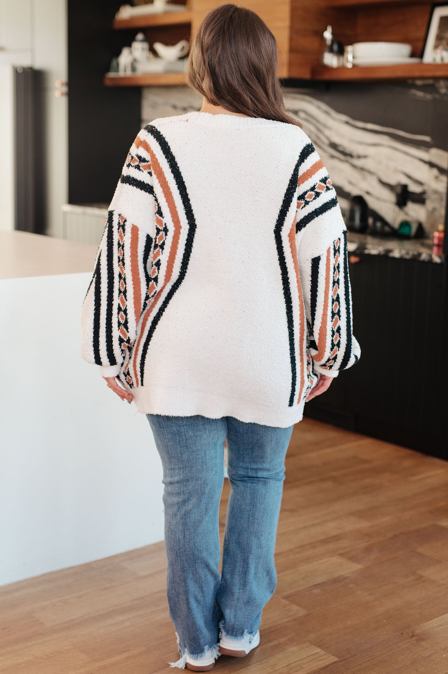 Back view of plus size Hollis Aztec Print Cardigan with Aztec print accent panel.