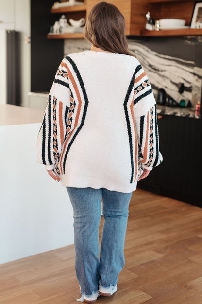 Back view of plus size Hollis Aztec Print Cardigan with Aztec print accent panel.