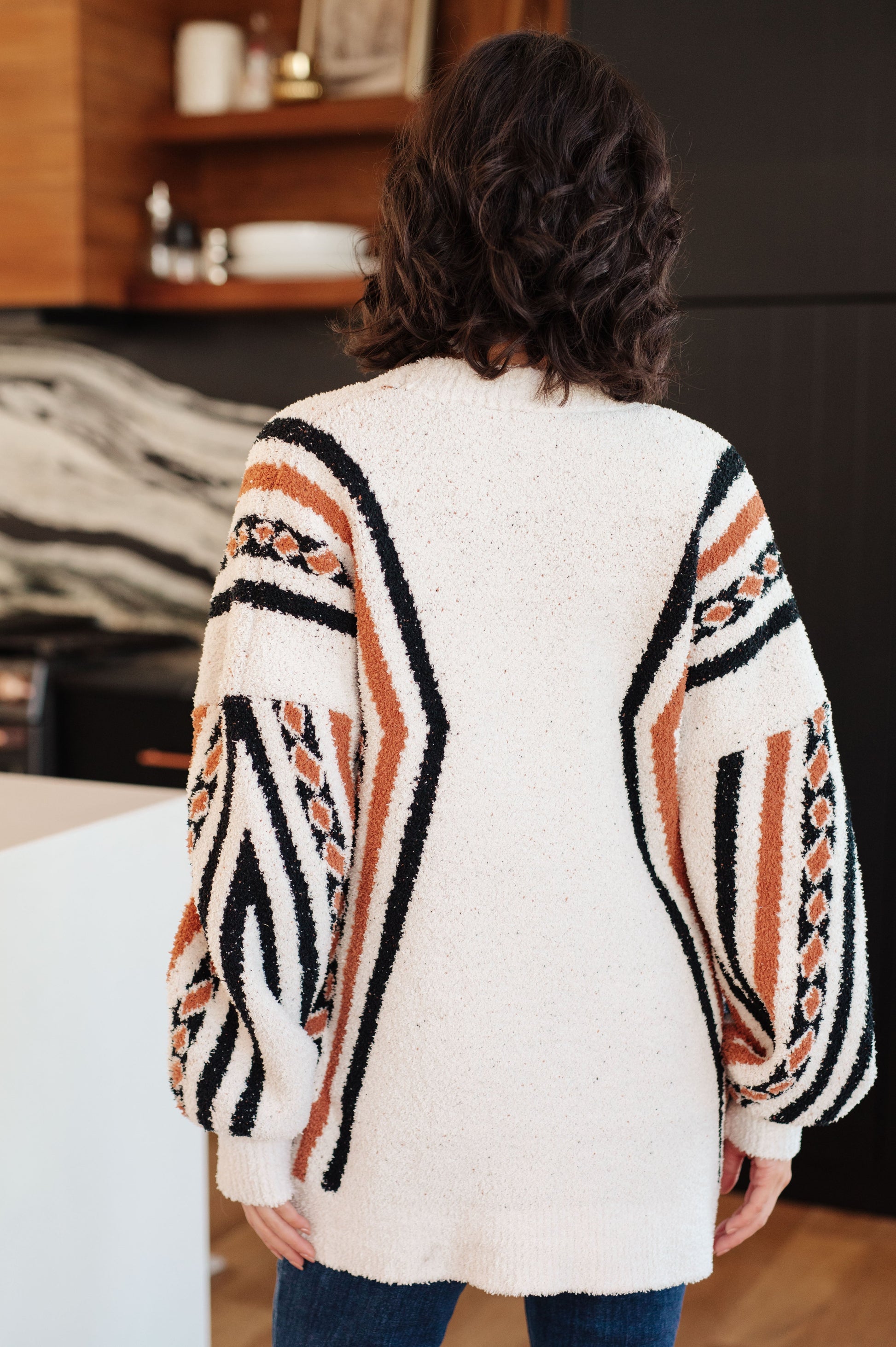 Back view of Hollis Aztec Print Cardigan with bold Aztec print panel detail.