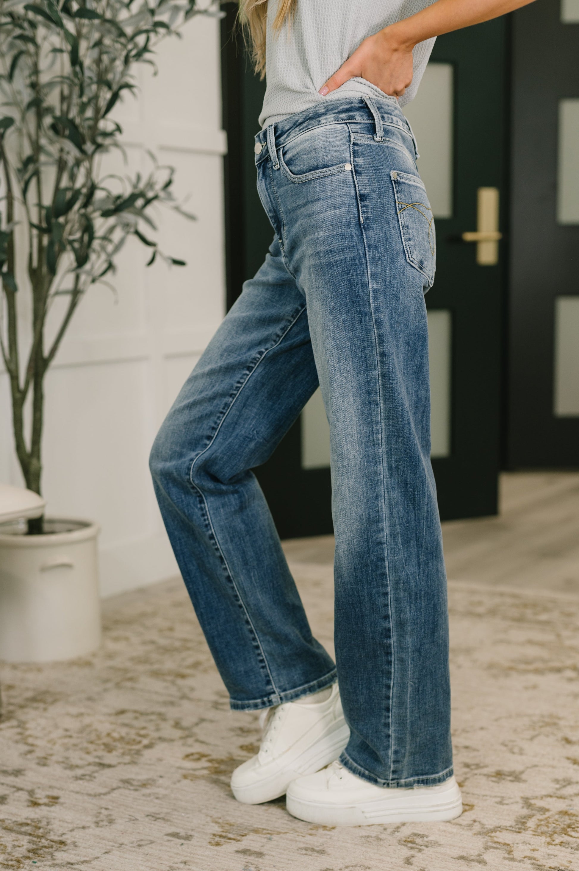 Side view of Holly Mid Rise Straight Jeans by Judy Blue classic straight silhouette.