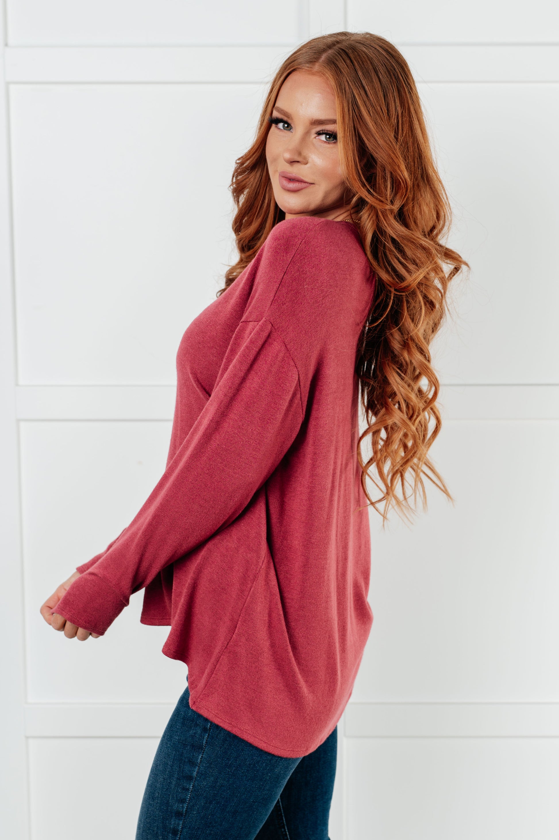 Corey Long Sleeve Top in Berry, made of lightweight brushed hacci knit fabric with a drop shoulder design for a cozy and stylish fit.