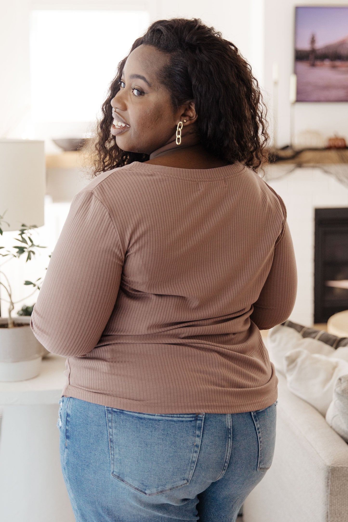 Back view of plus size Indie Long Sleeve V-Neck Top in Beige showing relaxed flattering fit.