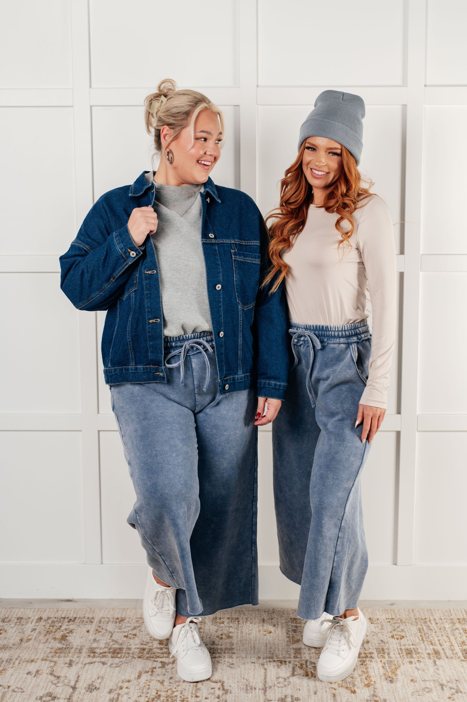 Indie Wide Leg Cropped Pants in soft fleece, featuring a trendy mineral wash in dusty blue. Designed with a drawstring elastic waist, functional side pockets, raw seam details, wide leg, and cropped length for a cozy, stylish, and relaxed look.