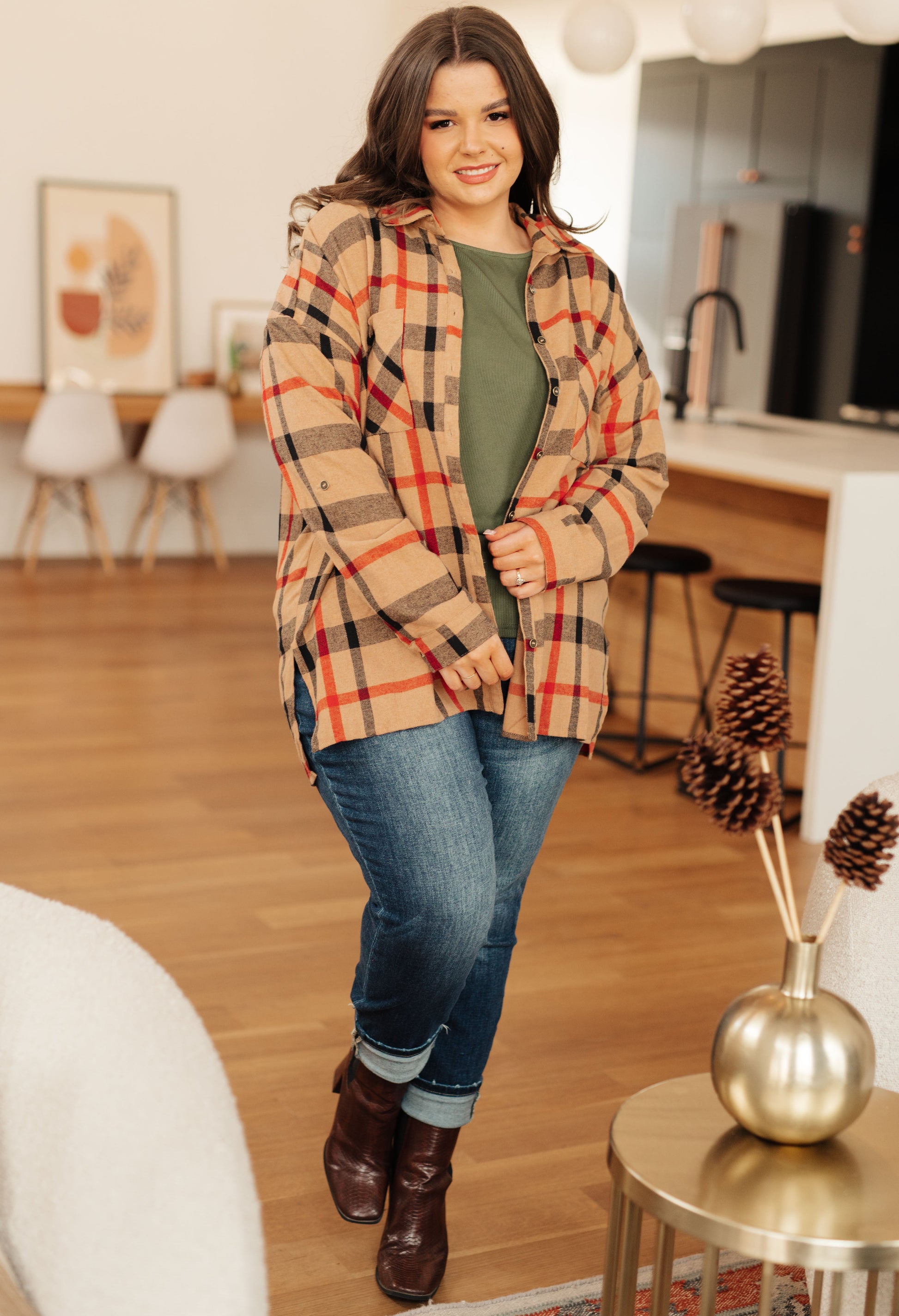 Women's lightweight flannel plaid shirt with a collared neckline, long sleeves with dropped shoulders, optional roll-tab sleeves, and side slits.