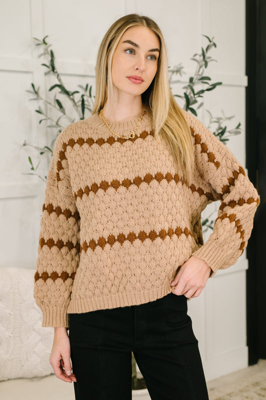 Model wearing Laney Textured Sweater in taupe with diamond striped knit pattern.