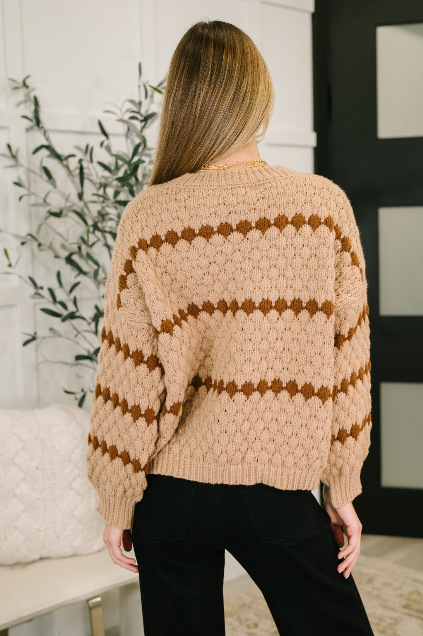 Back view of Laney Textured Sweater showing textured knit and relaxed silhouette.