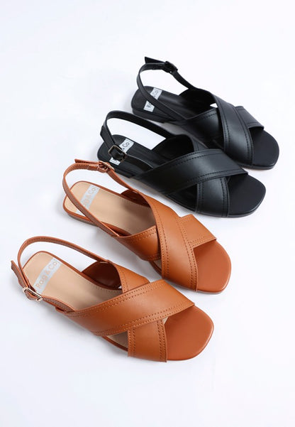 Jamon Classic Cross-Strap Buckled Flats in Tan and Black with square toe and slingback.