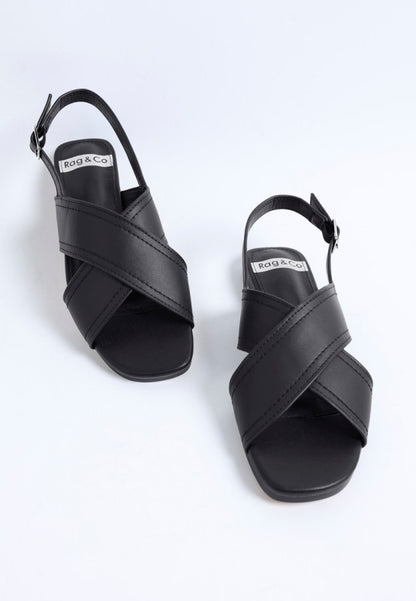 Jamon Classic Cross-Strap Buckled Flats in Black with square toe and slingback strap.
