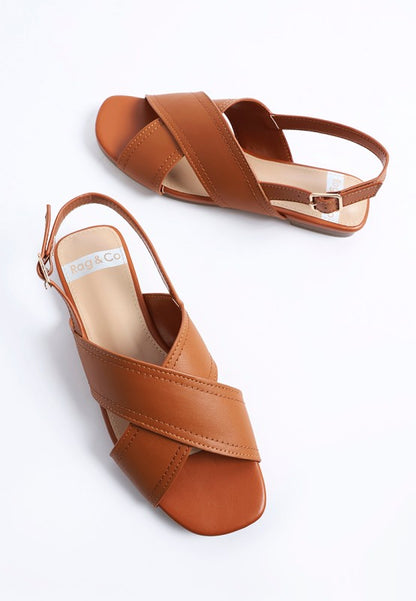 Angled view of Jamon Classic Cross-Strap Buckled Flats in Tan square toe silhouette.