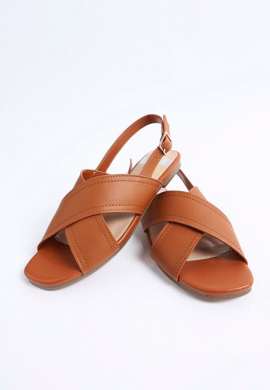 Front view of Jamon Classic Cross-Strap Buckled Flats in Tan cross strap leather design.