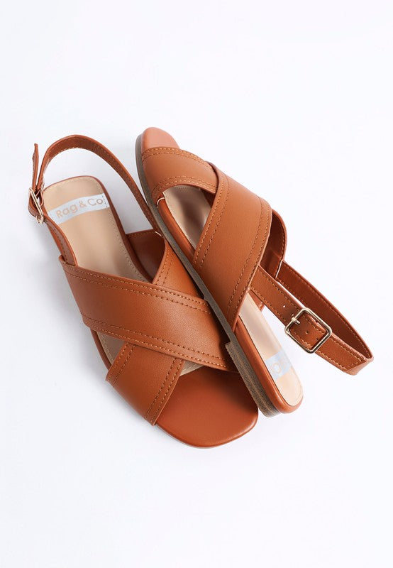Side view of Jamon Classic Cross-Strap Buckled Flats in Tan cross strap leather design.