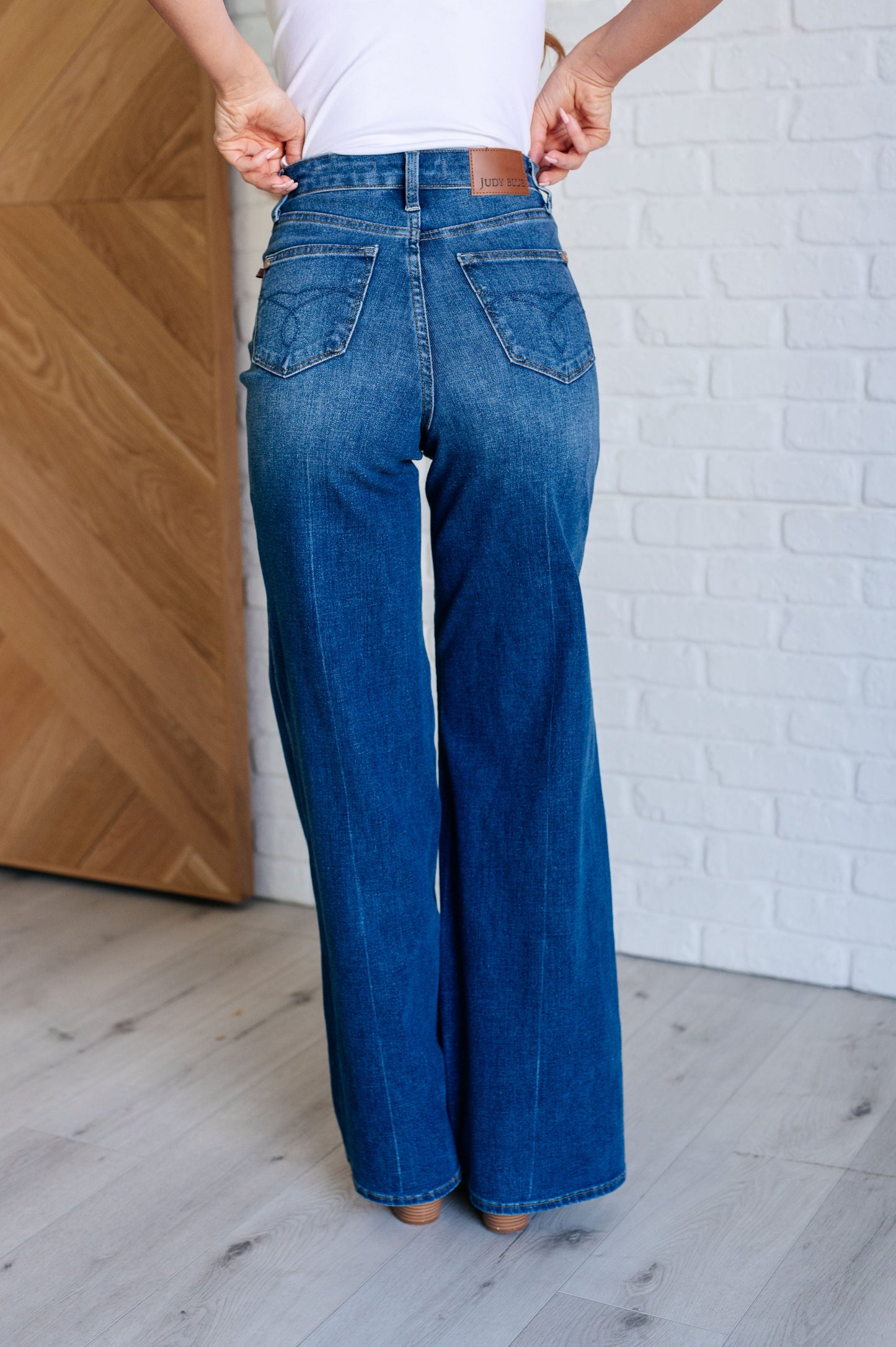 Judy Blue High Rise Control Top Retro Wide Leg Jeans in dark wash, featuring a zip fly, tummy control, and wide-leg silhouette