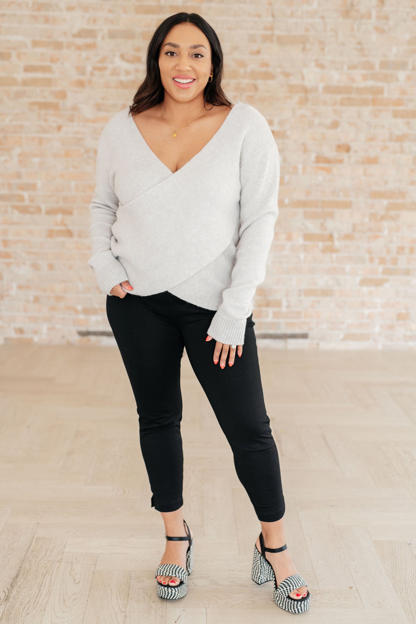 Front view of plus size Lana Sweater Top showing relaxed fit and ribbed hem.