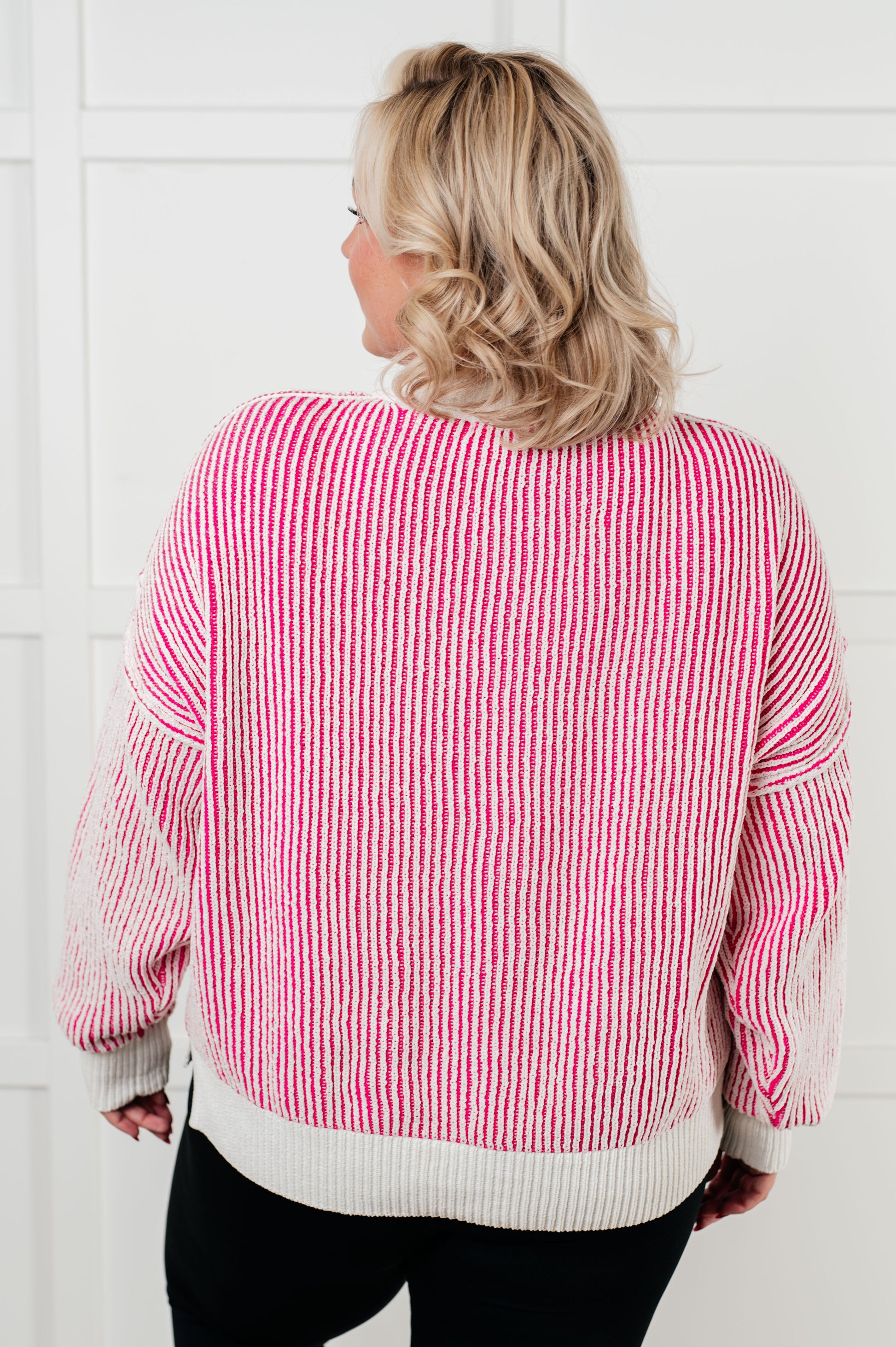 Lissa Contrast Trim Sweater with textured knit, banded ribbed neckline, cuffs, and hemline, drop shoulder design, and side slits for a chic and cozy look.