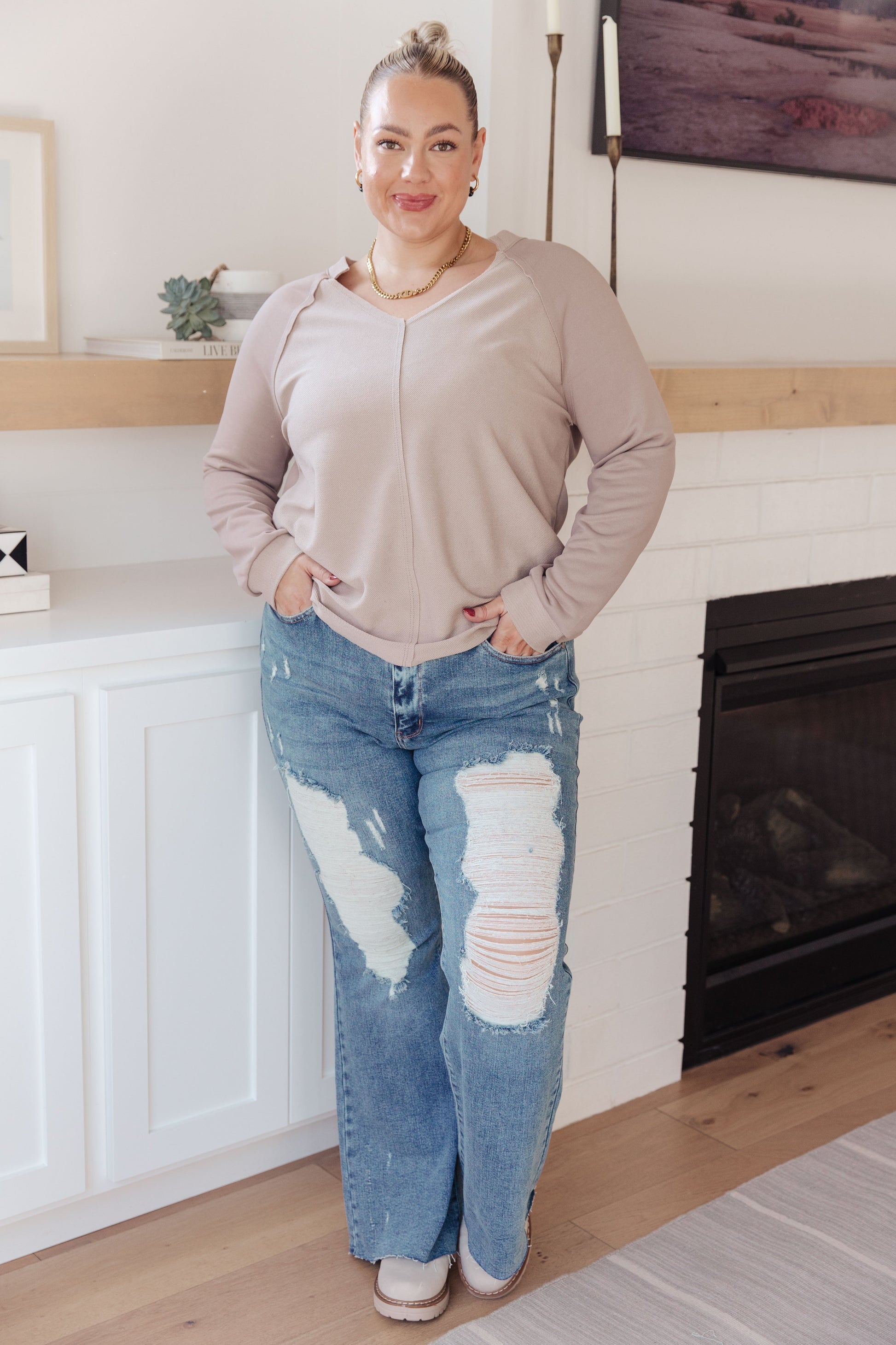 Plus size model full body in Dominique V-Neck Top styled with jeans, casual knit top with relaxed fit