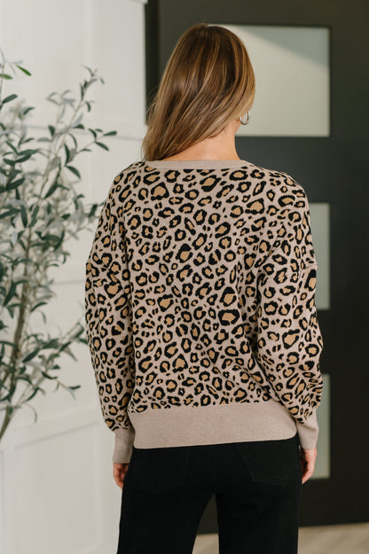 Back view of Lilith Leopard Print Pullover highlighting high-stretch mid-weight knit.